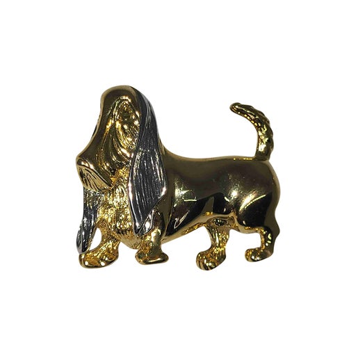 Golden metal brooch