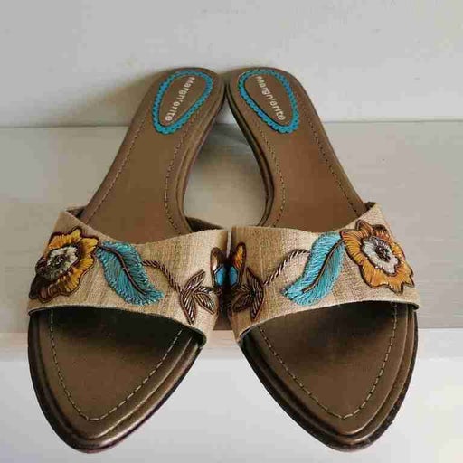 Mules en cuir et toile