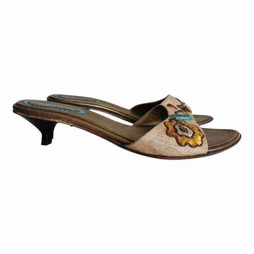 Mules en cuir et toile