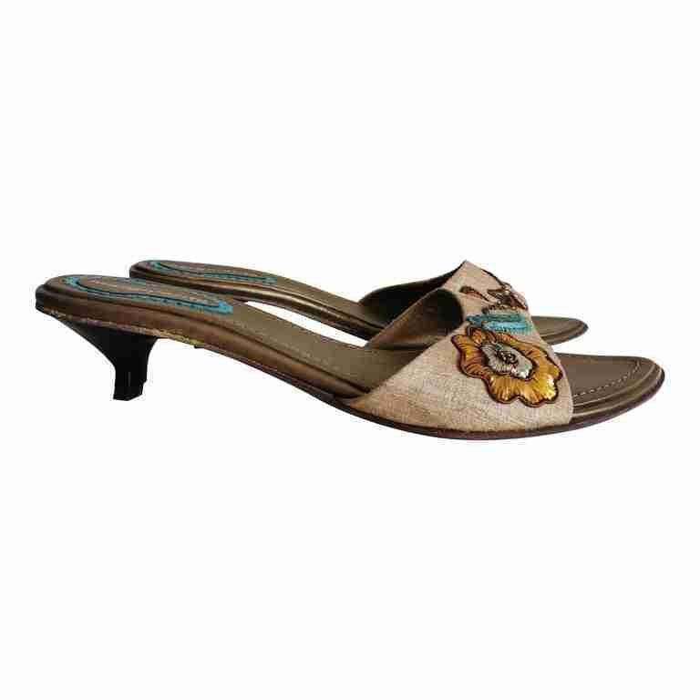 Mules en cuir et toile