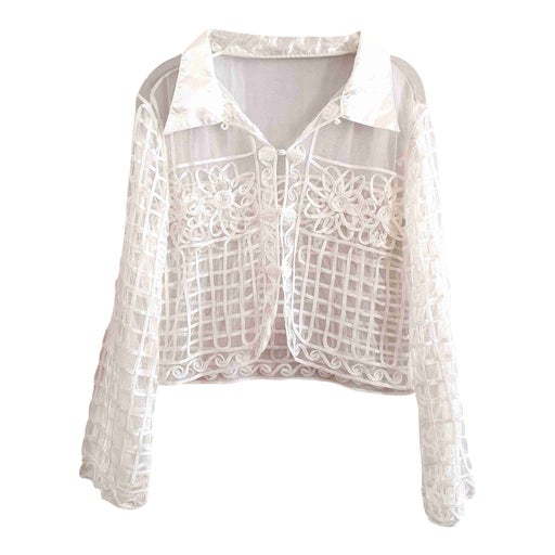 Short jacket in embroidered tulle