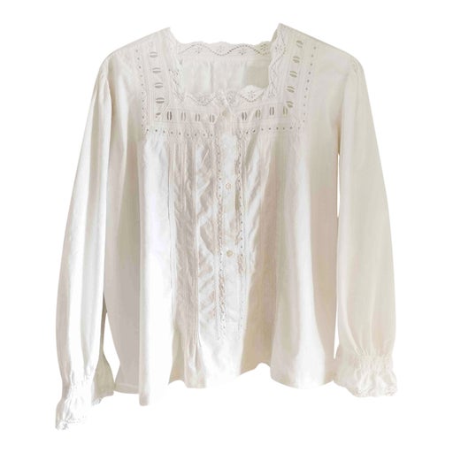 Lace and embroidery blouse.