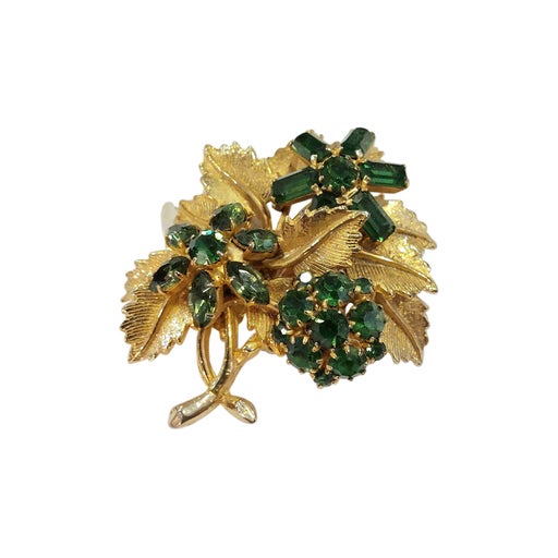 Golden metal brooch