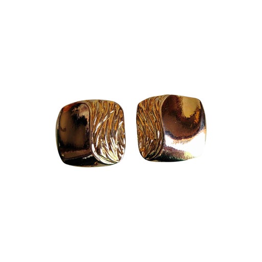 Golden metal earrings