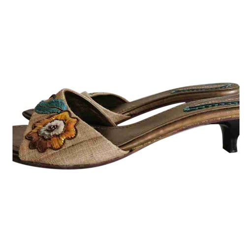 Mules en cuir et toile