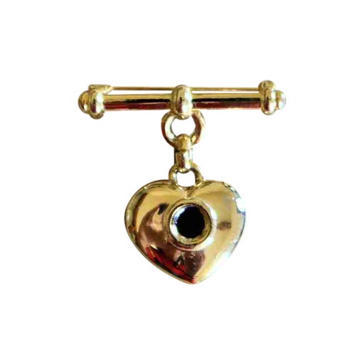 Golden metal brooch
