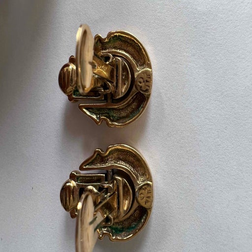 Golden metal earrings