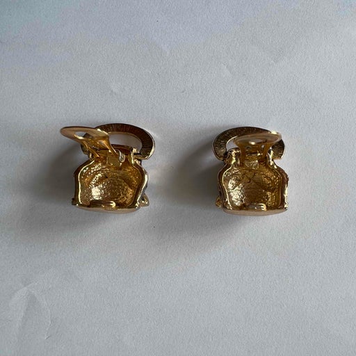 Golden metal earrings