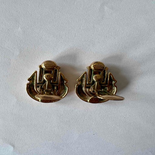 Golden metal earrings