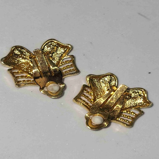 Golden metal earrings
