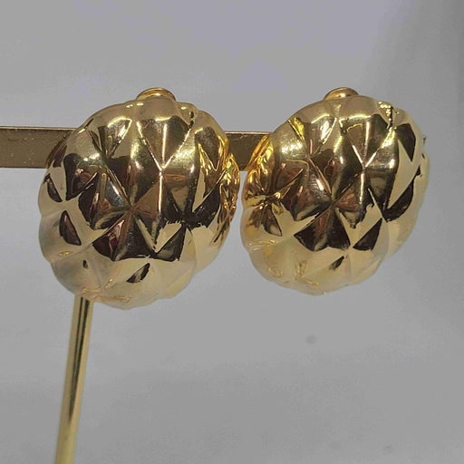 Golden metal earrings