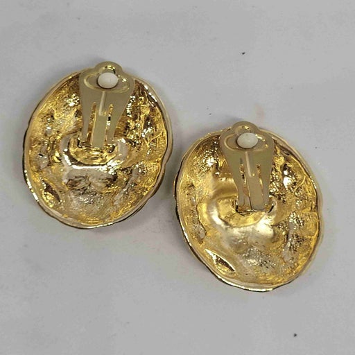 Golden metal earrings