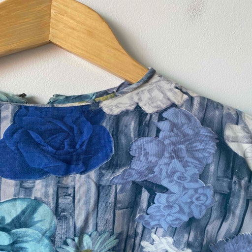 Blouse sans manche à fleurs des années 70,
