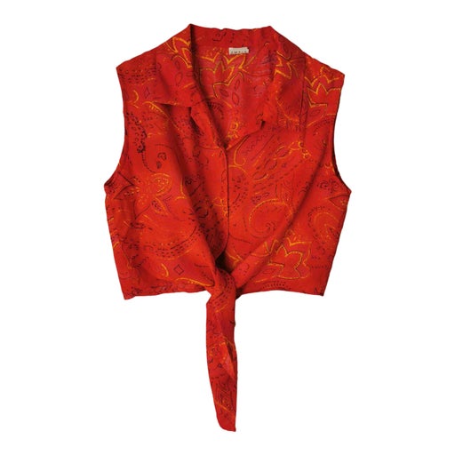Top court sans manches. A motifs abstraits
En