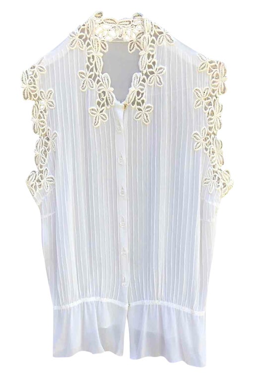 Embroidered sleeveless blouse
