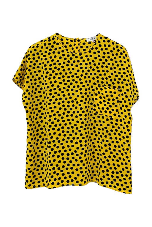 Yellow blouse with black polka dots
