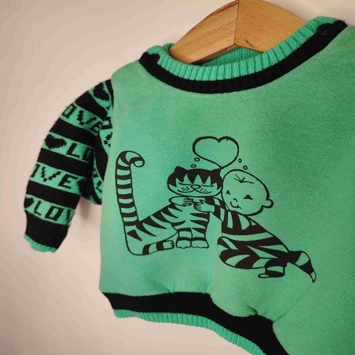Sweat avec manches tricots "Love" et motif