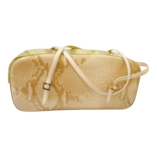sac baguette en cuir Emanuel Ungaro

Adorable