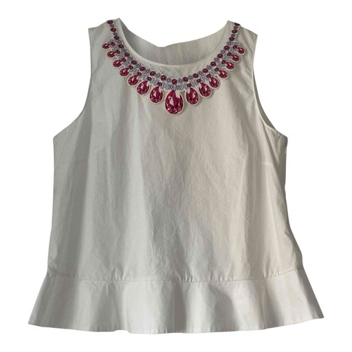 Top Moschino sans manches à falbalas.