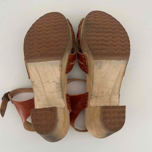 Leather and wood clogs