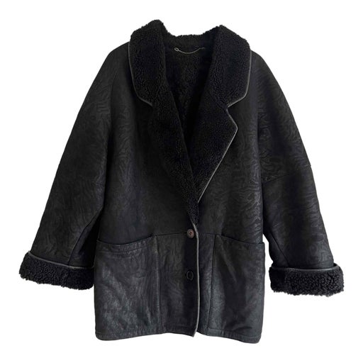 Manteau en peau lainée