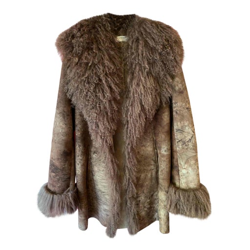 Manteau en cuir et fausse fourrure