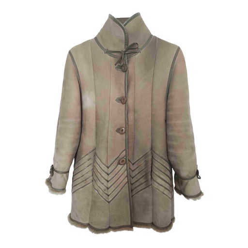 Manteau en peau lainée.
