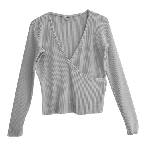 Pull cache cœur en maille