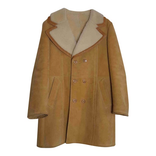 Manteau en peau lainé