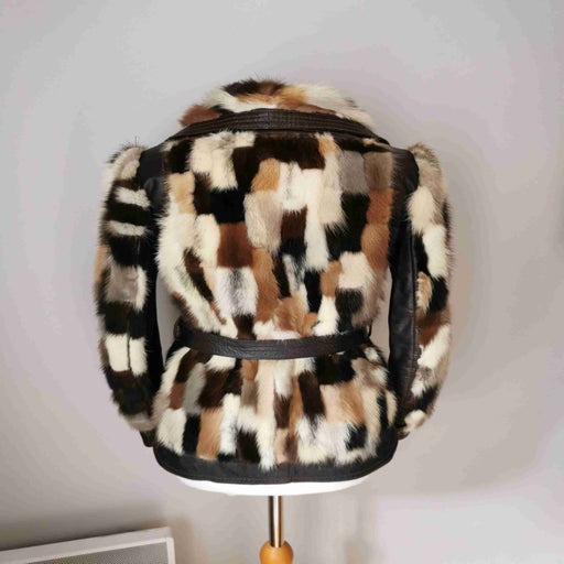 Fur and leather coat