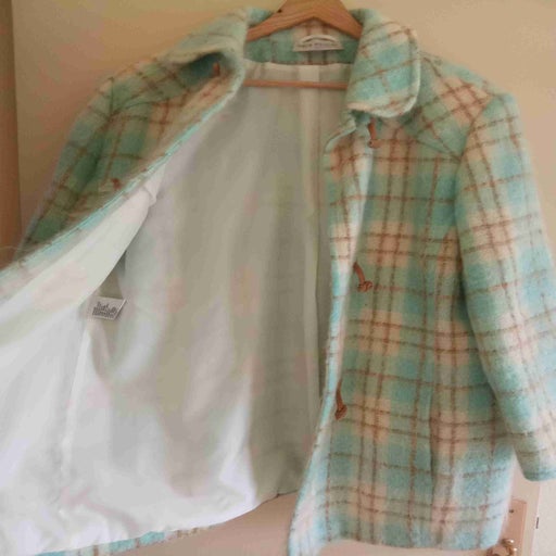 Checked coat.