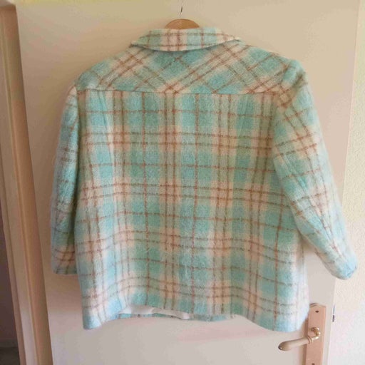 Checked coat.