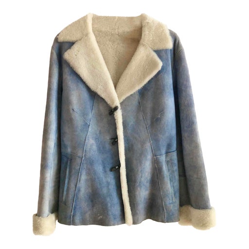 Manteau en peau lainée 