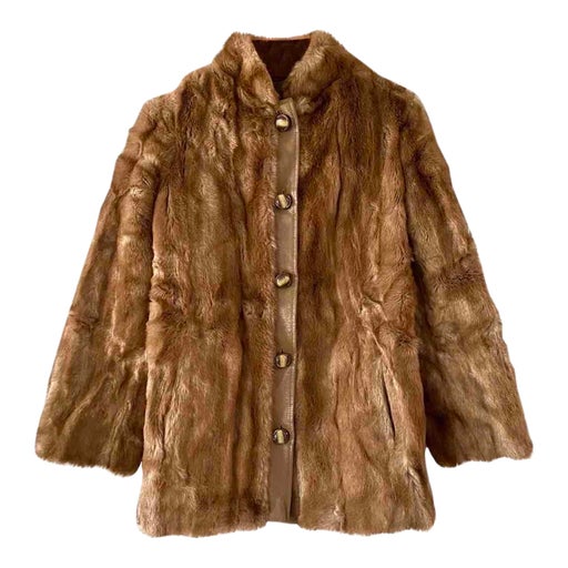 Leather and faux fur coat