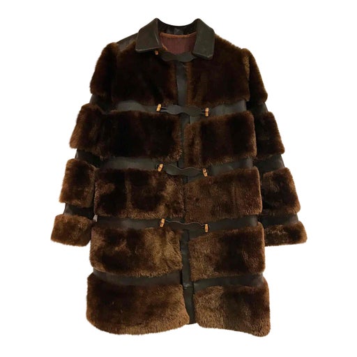Leather and gold sheepskin coat