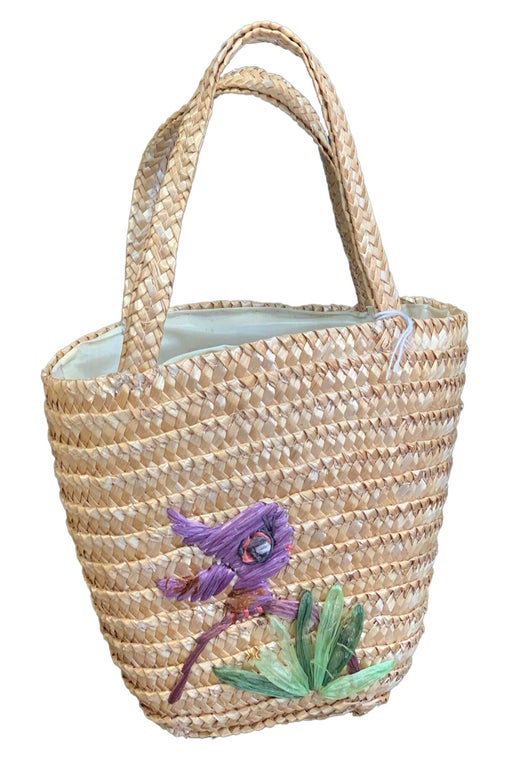 Embroidered raffia basket