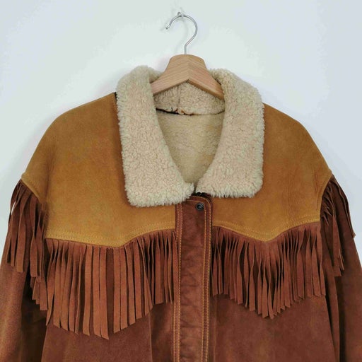 Embroidered shearling coat