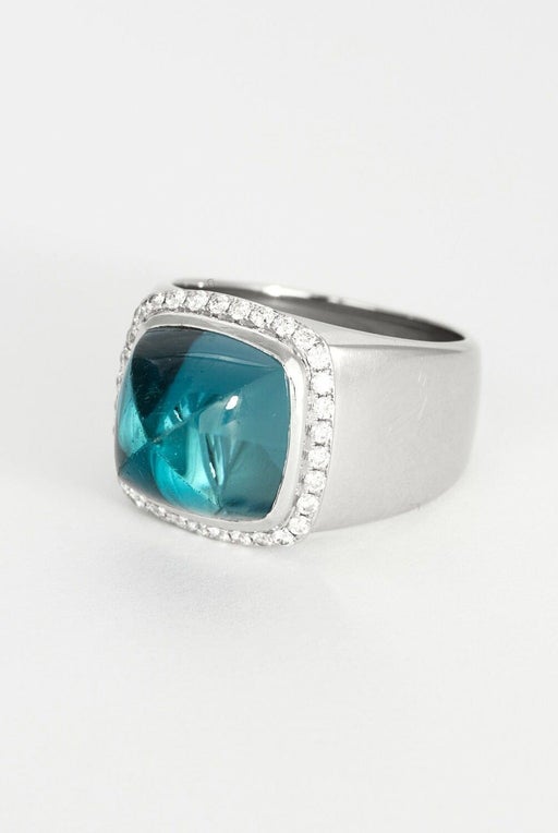 FRED - Or blanc, Topaze et Diamants.