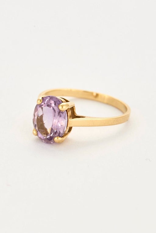 Bague en or jaune et améthyste